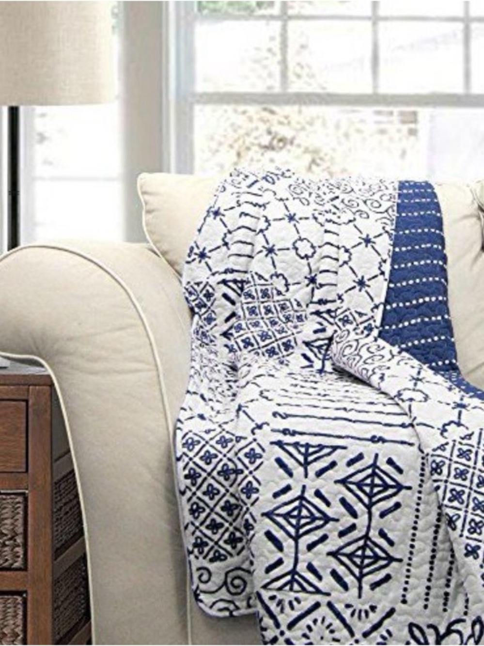 Blue and White Patterned Throw Quilt